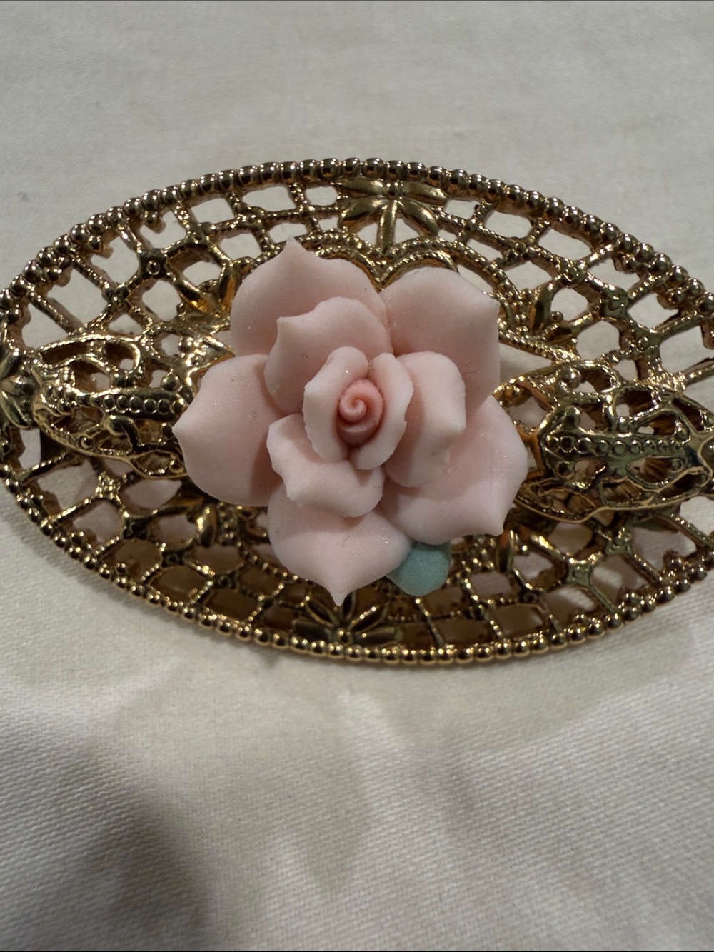 Gold Tone Filigree Brooch with Pale Pink Porcelain Rose